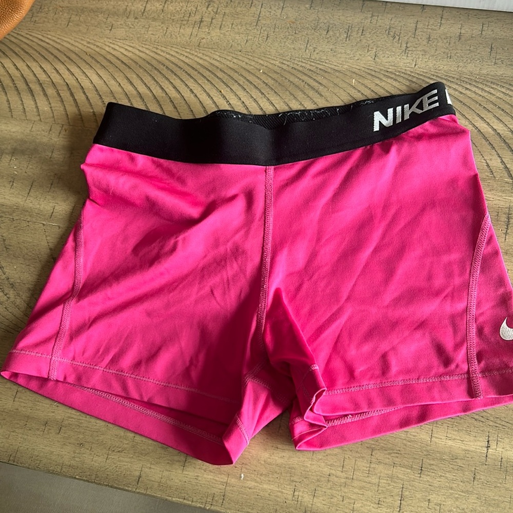 Pink Nike pro compression shorts, Medium